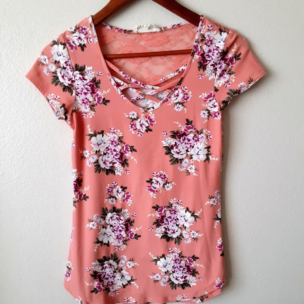 Pretty peach colored floral top.